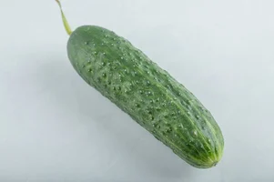 close-up-of-whole-fresh-green-cucumber-high-quality-photo_114579-35419.webp