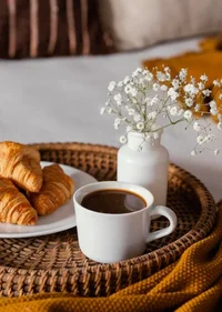 high-angle-croissants-coffee-cup_23-2148877594.webp
