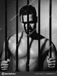 depositphotos_165797602-stock-photo-sexy-man-behind-bars.webp